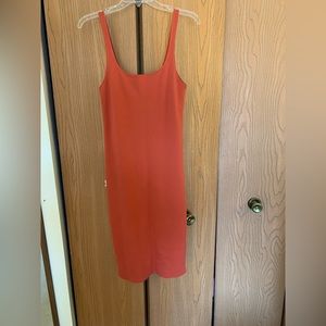 Burnt orange body con slit midi dress